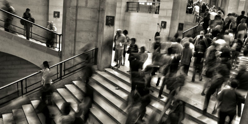 Workers in busy office building