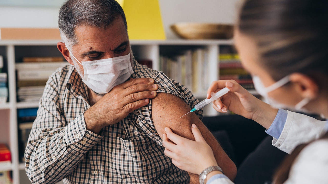 Employee getting a required vaccine