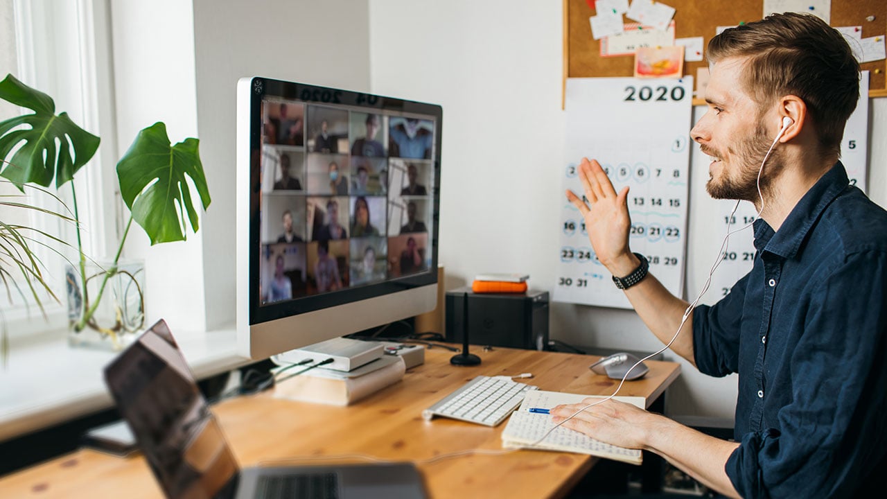 Man working over Zoom due to business process outsourcing.