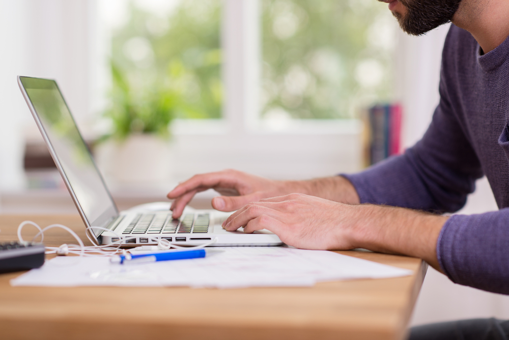 Man working remotely on his laptop